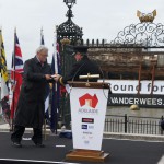 Richard Doughty handing a gift to Andrew Chapman to commemorate the event.