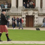 A piper marking the occasion